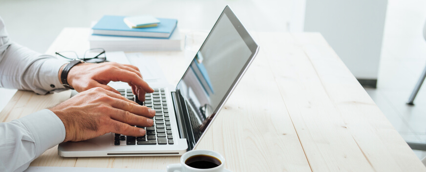 Person typing on a computer