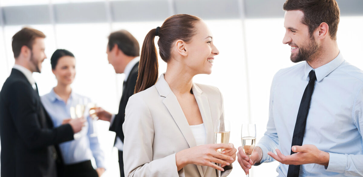 A group of individuals enjoying beverages at an event.